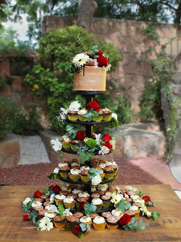 Cupcake tower with symbolic cake